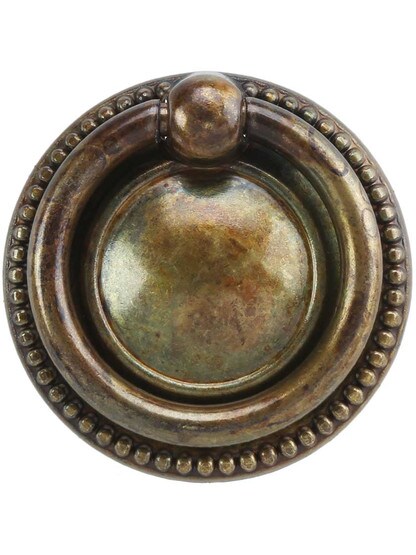 Beaded Round Single-Post Pull - 1.57 inch Diameter in Antique Brass Distressed.